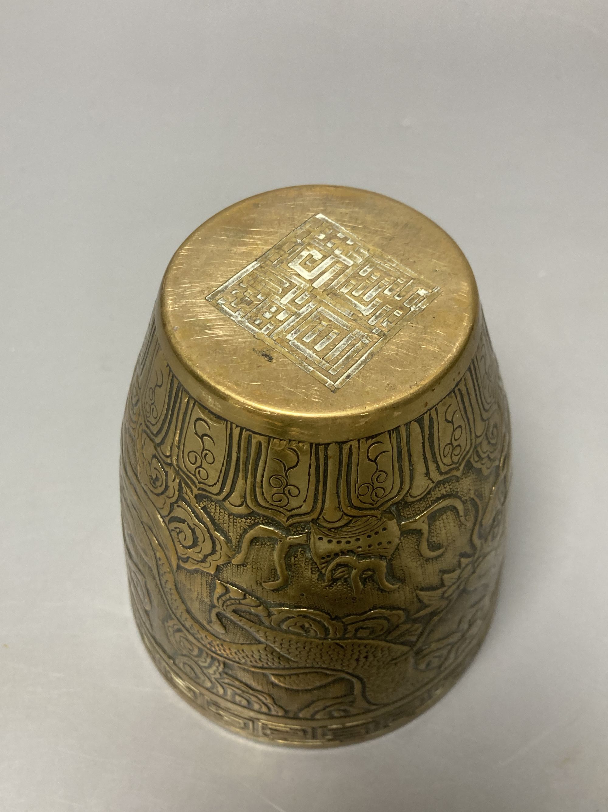 A Chinese carved bronze vase, Xuande mark, late Qing dynasty, height 11cm